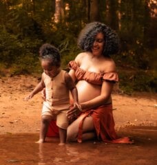 Ashley Renne and her son in the water playing